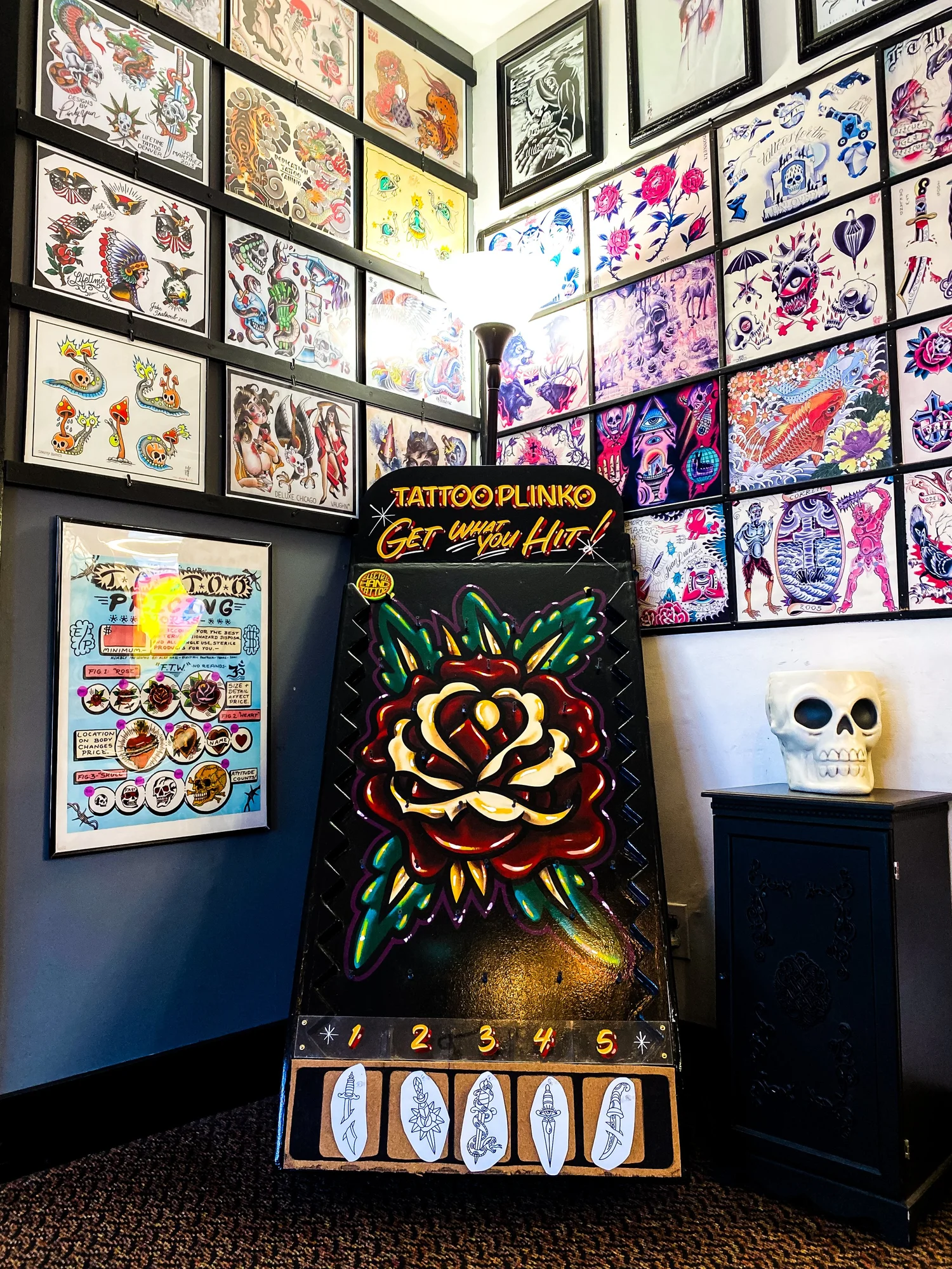 Inside Electric Hand Tattoo -- flash walls and Tattoo Plinko
